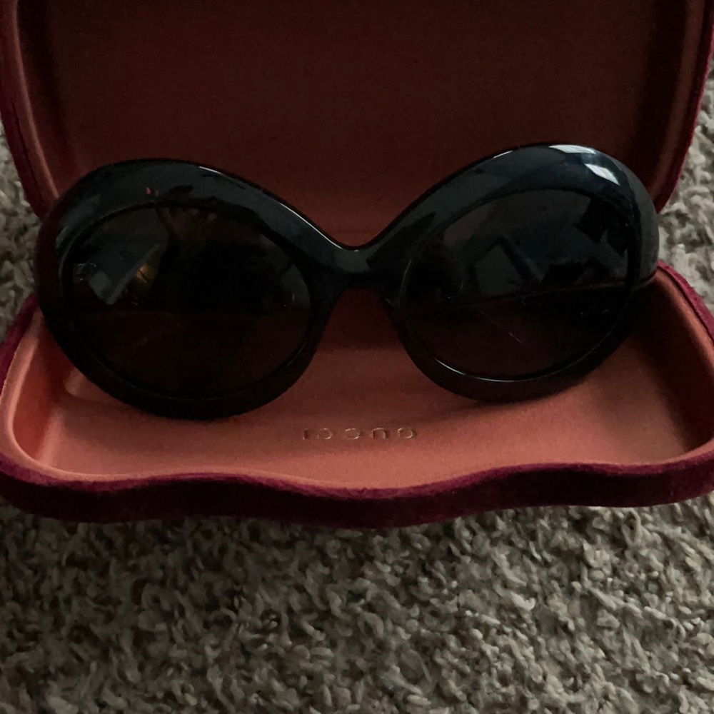 Gucci’s black sunglasses